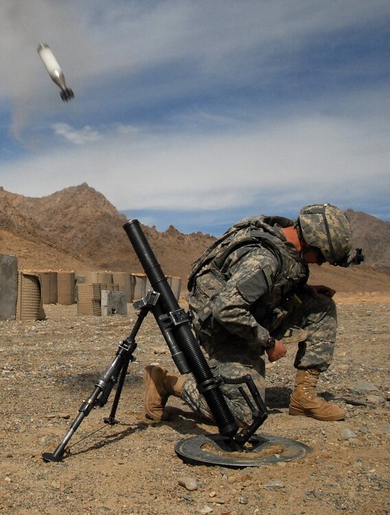 60mm_mortar_round_being_launch_(crop).jpg
