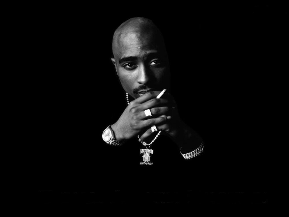 Tupac-1024x768-tupac-shakur-25745478-1024-768.jpg